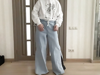 Sissy in wide leg palazzo bootcut flared jeans and white hoodie on high heels ready for the evening dancing and cum