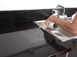 mature granny pissing in sink