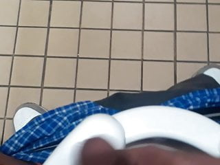 Stroking in the public restroom 