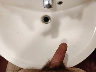 Hairy dick pissing