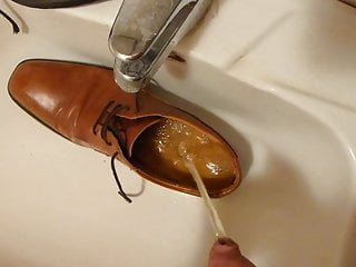Piss in men&#039;s dress shoe