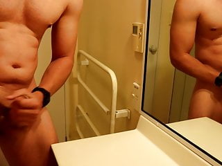 MUSCULAR GUY WITH THICK COCK SHOOTS LOAD ALL OVER BATHROOM!