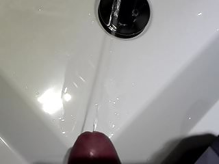 Pissing in a sink