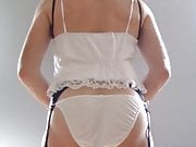 Crossdresser in silky white lingerie (Thlin2162)