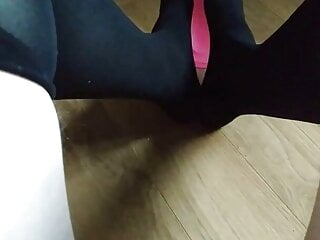 Cute little sissy trying practice footjob in black stockings