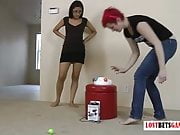 Two fit babes playing a memory game, loser strips and faces 