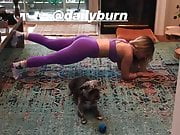 Joanna ''JoJo'' Levesque doing hot yoga on the floor