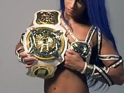 WWE - Sasha Banks with a title belt