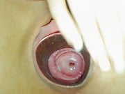 Woman showing her gaping pussy and cervix
