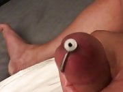 Cumming with a cock plug inserted