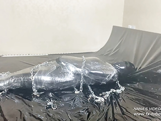  video: Bodysuit with 5 layers and mummification - Leather Girl