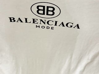 Finishing pissing on her Balenciaga t-shirt