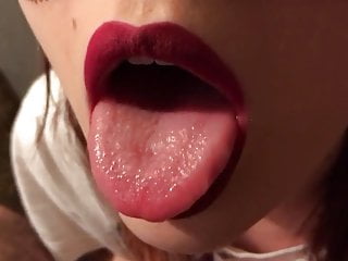 Masked girl gets cum on her tongue and smallow it