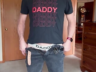 Daddy strips from street clothes to his jock strap  shows his butt plug takes it out and plays with and dildo  gets totally naked puts on ox balls cock ring and balls harness starts stroking his fat cock  KingKunga.