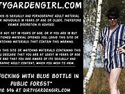 Ass fucking with blue bottle in public forest