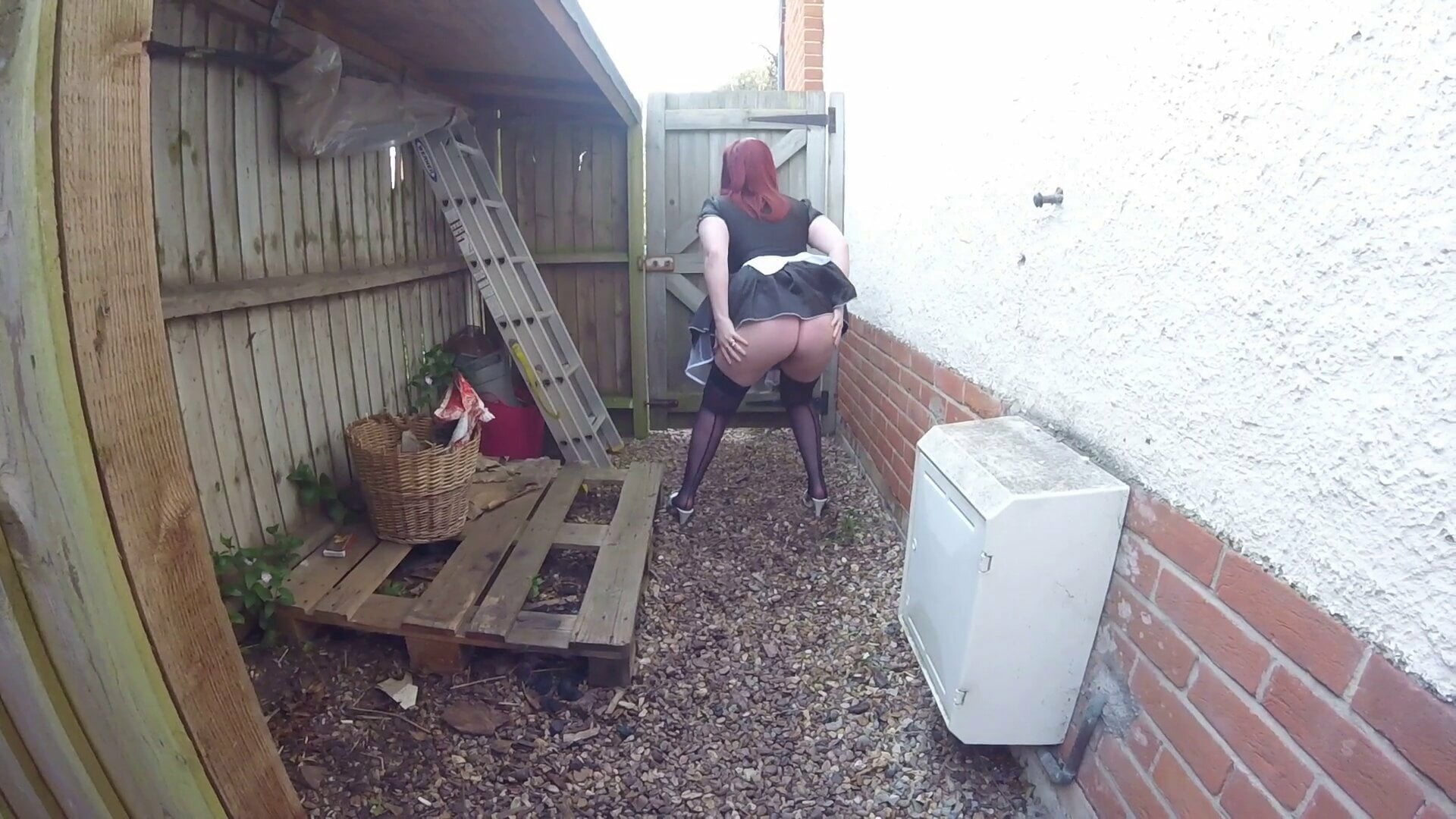 French Maid in stockings and Heels outdoors