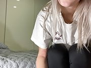 Cute girl sniffs her own shoes and nylon socks