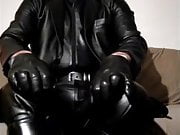 Smoking in full leather fetish gear