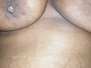 Ebony playing with big tits