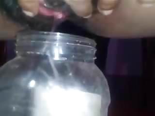 Sri lankan girl pissing bottle...