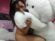 Girl playing with bear