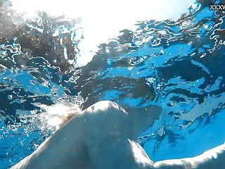 Swimming Pool Erotics video: Outdoor swimming pool erotics with naked Zazie