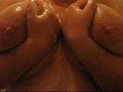 BBW - Washing her huge breasts (close-up)