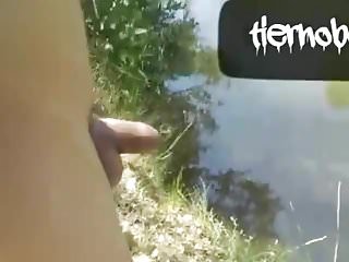 Naked Twink In The River Is Pissing And Cumming