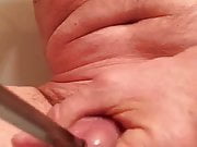 Inserting huge metal rod in penis