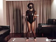 Fejira com, Latex girl wearing vibrator in motion