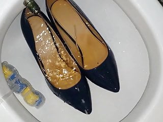 Pissing Into Dark Blue Stilettos Bought From A Bank Employee...