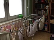 CD Crossdresser Hanging up laundry in DW Lingerie