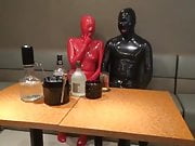 Latex Couple Has Sex in a Bar