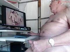 Grandpa cums while watching porn