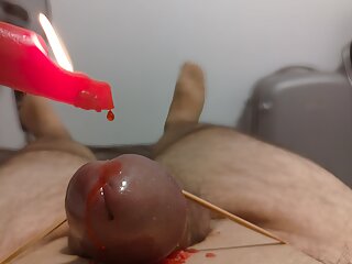 Hot wax on cock and balls