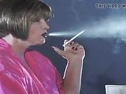 Michelle smoking in pink gown