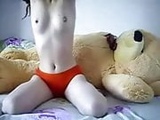 Asian beautiful woman humping her giant teddy bear 