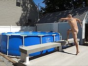 Naked while jumping into the pool