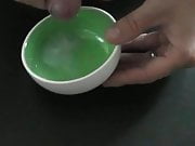 Cum in a  green bowl