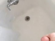Jacking off and cumming in the shower