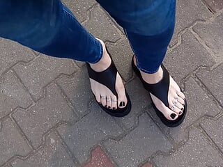 I walk around and show off my feet in sexy platform flip flops