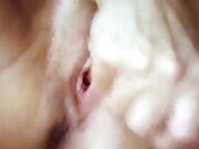Wife jerking my cock until I cum on her pussy.
