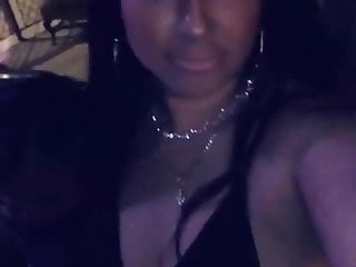 black milf showing her figure in the club