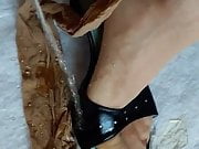 Feet in Nylons and High heels soaked in Piss